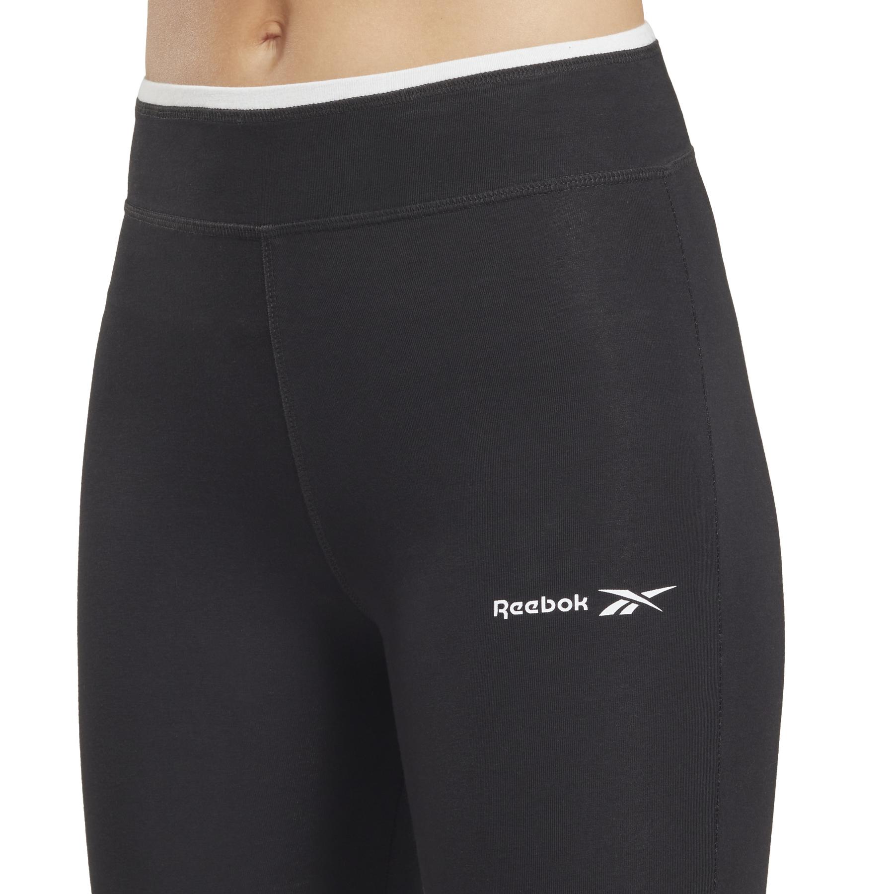 product/r/e/reebok_ht8060_5_apparel_on_model_detail_view_1_white.jpg